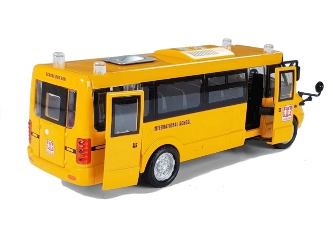 Autobus scolaire en métal avec moteur à remontoir