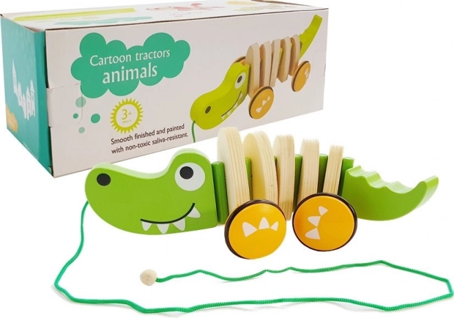 Crocodile en bois sur roulettes 18cm