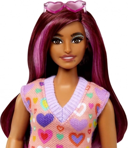 De longs cheveux avec des mèches roses