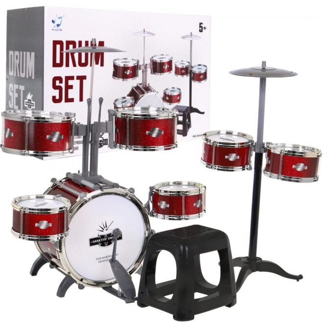 Batterie rouge avec 7 fûts + tabouret + 2 cymbales + 2 baguettes - 12 pièces