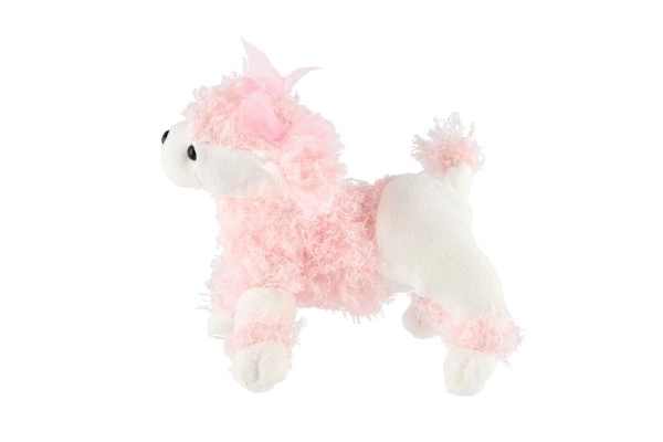 Caniche en peluche rose dans un sac à main