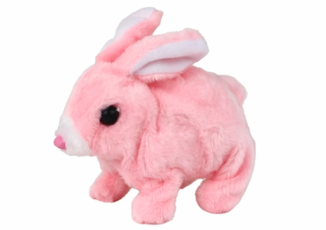 Jouet interactif lapin marcheur à poils courts rose