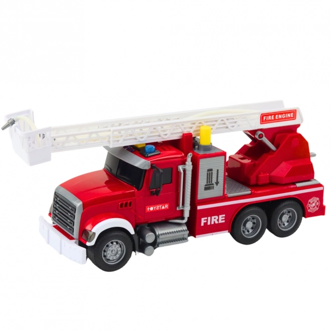 Grand camion de pompiers avec échelle extensible et fonction de jet d'eau
