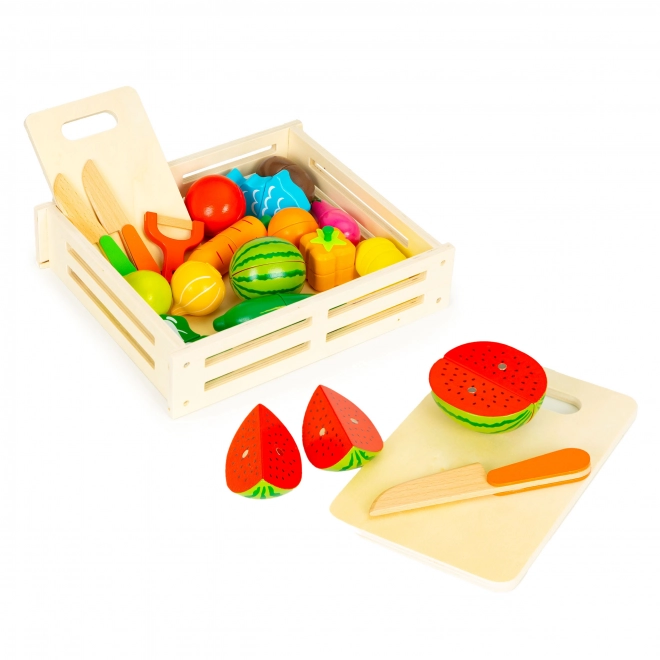 Fruits et légumes en bois à découper dans une boîte