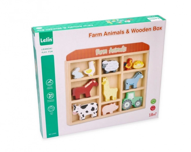 Ensemble d'animaux de ferme en bois dans un cadre