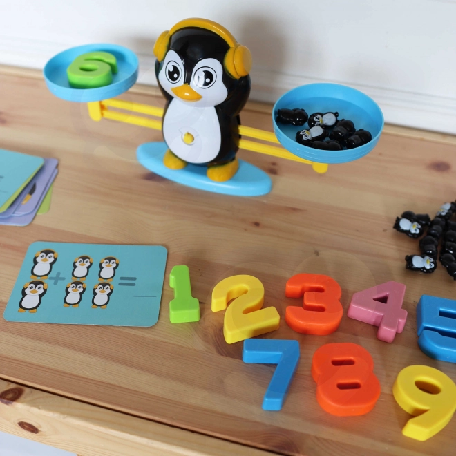 Balance d'équilibre Woopie avec pingouins pour l'apprentissage des mathématiques