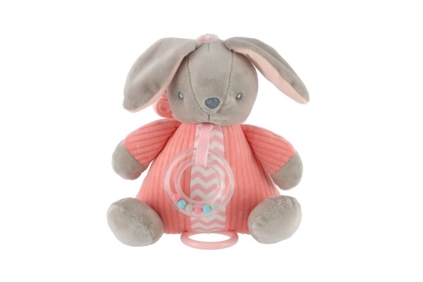 Lièvre musical à remonter avec hochet en peluche 18x20cm rose sur carte en sachet 0+