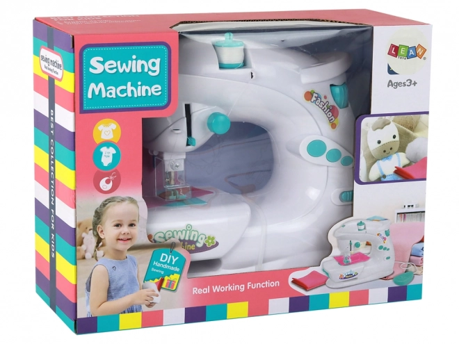 Machine à coudre pour enfants comme une vraie blanche avec piles