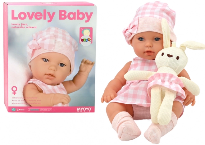 Poupée Bébé avec Porte-bébé Lapin en Vêtements à Carreaux Roses