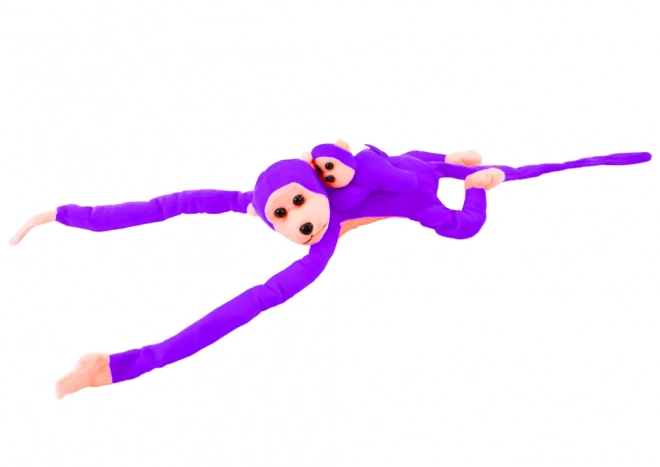 Singe en peluche violet avec bébé