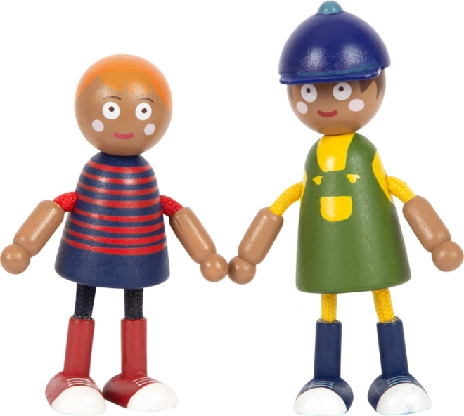 Petites figurines en bois famille avec fauteuil roulant