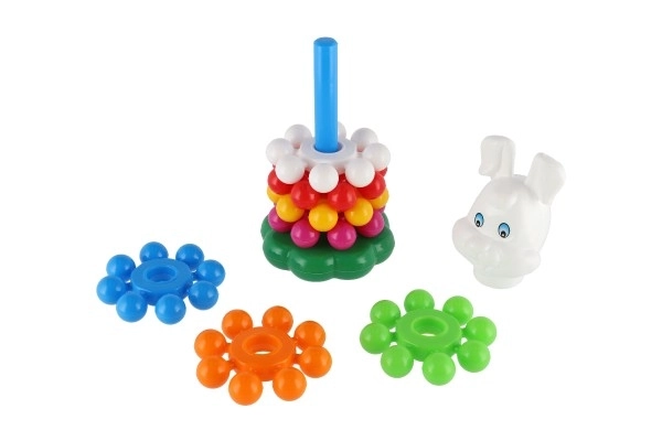 Puzzle pyramide avec anneaux en plastique 26cm dans un filet 12m+