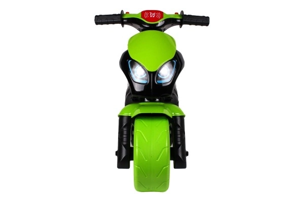 Trottinette moto vert-noir en plastique à batterie avec lumière et son, dans un sac 36x53x74cm