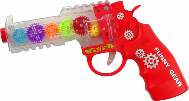 Pistolet avec lumières colorées et sons - rouge