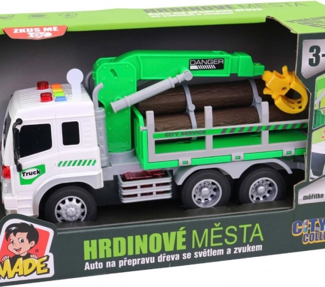 Camion de transport de bois avec bras élévateur et effets lumineux