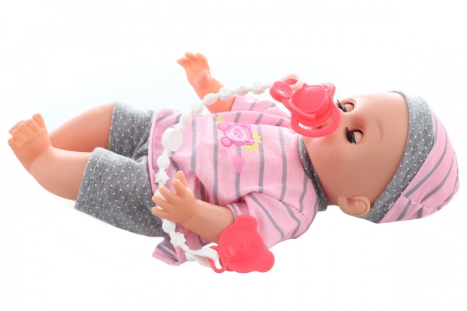 Bébé qui pleure 28 cm avec sons et accessoires