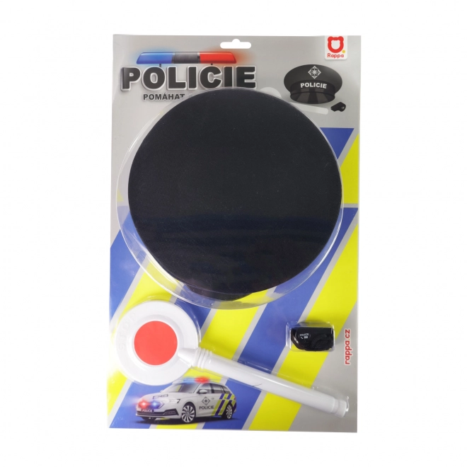 Ensemble de police tissu/plastique casquette, bâton, sifflet sur carte 30x48x8cm