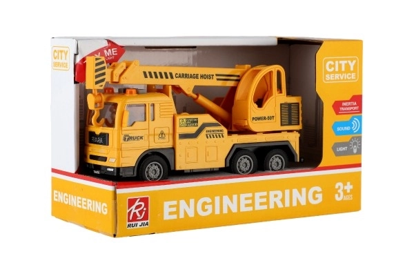 Grue automatique en plastique 16cm à inertie sur batterie avec lumière et son en boîte 21x13x9cm