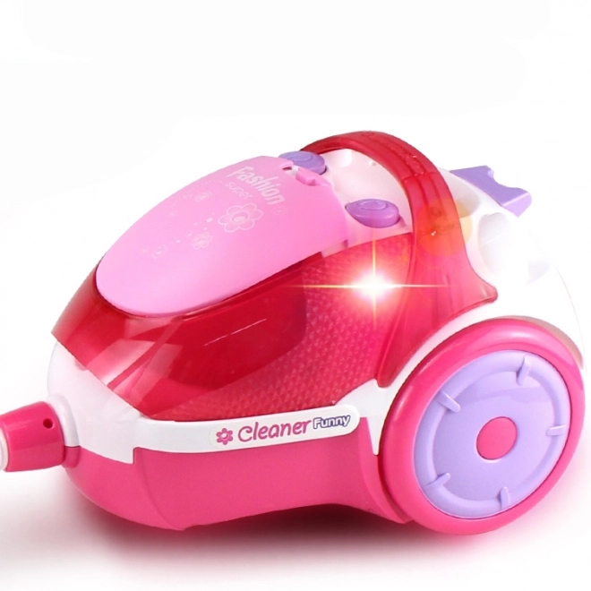 Aspirateur rose pour enfants avec fonction d'aspiration