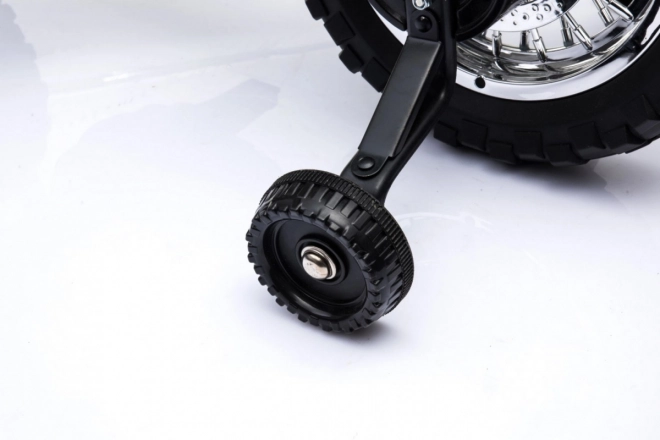 Moto cross électrique pour enfants à batterie – verte, avec roulettes stabilisatrices et feux LED