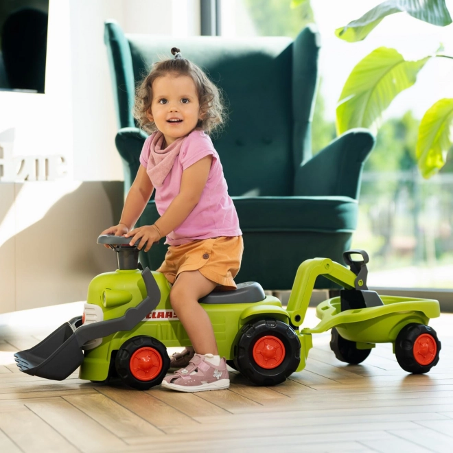 Tracteur roulant Claas avec remorque, chargeur et pelle