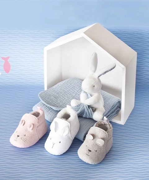 Doudou Premiers chaussons 0-6 mois gris
