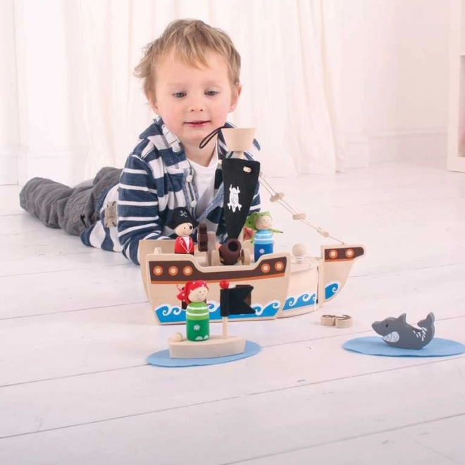 Bateau pirate en bois avec accessoires de Bigjigs Toys
