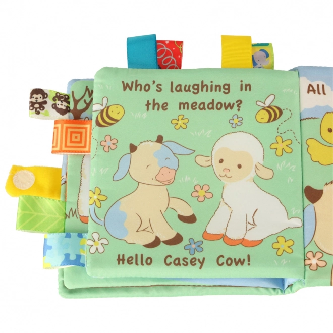 Livre sensoriel pour bébé avec un mouton et des étiquettes