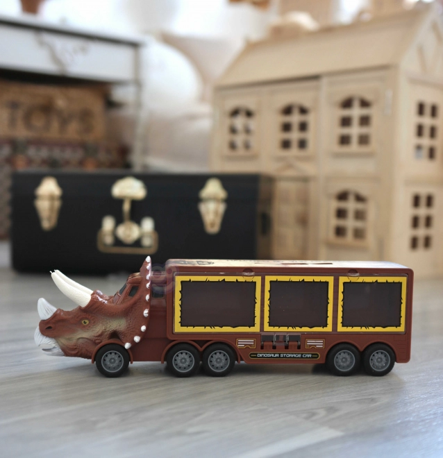 Camion dinosaure avec lanceur et petites voitures