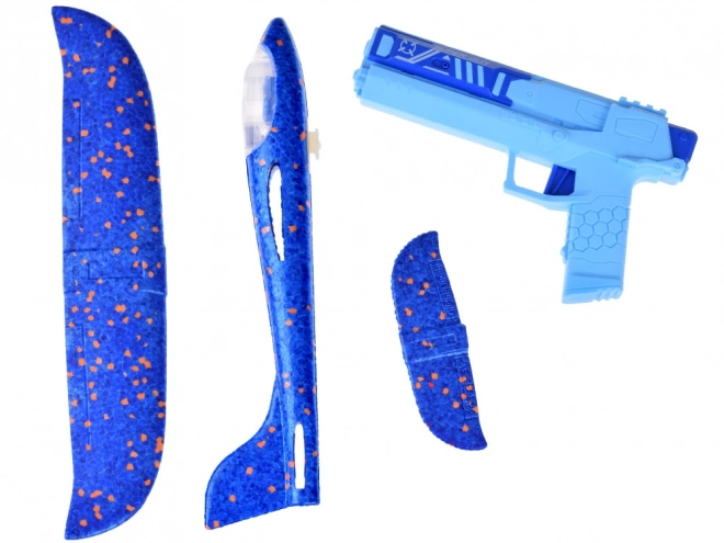 Avion en mousse amusant avec lumières LED lancé depuis un pistolet