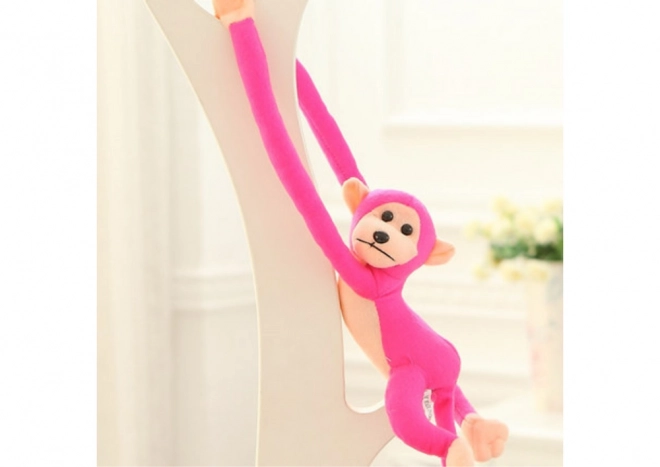 Mascotte en peluche singe avec son rose foncé 60 cm