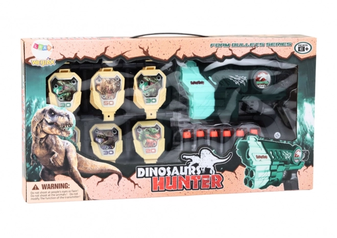Pistolet avec cible et fléchettes en mousse - dinosaures