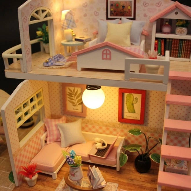 Maison de poupée en bois avec éclairage LED