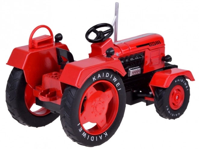 Tracteur métallique rouge avec roues en caoutchouc 1:18
