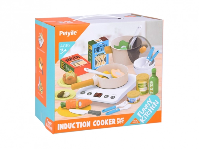 Cuisine pour enfants avec plaque à induction et accessoires