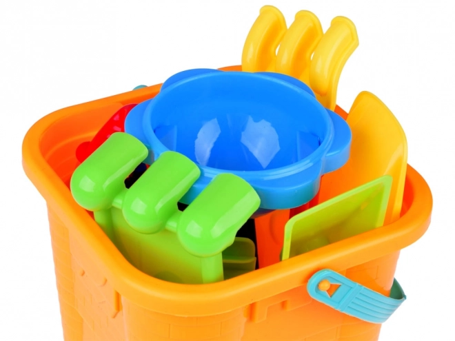 Ensemble de jeux de sable avec seau, moules et outils