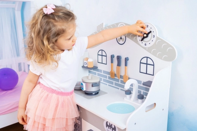 Cuisine en bois avec accessoires Maison