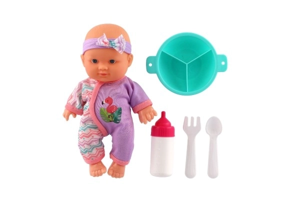 Poupée bébé 20cm corps rigide avec accessoires dans la boîte 23x24x8cm