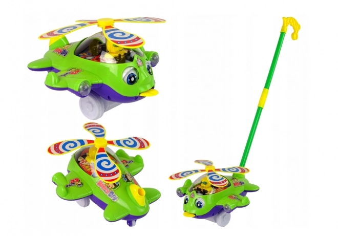 Hélicoptère pousseur vert avec pilote