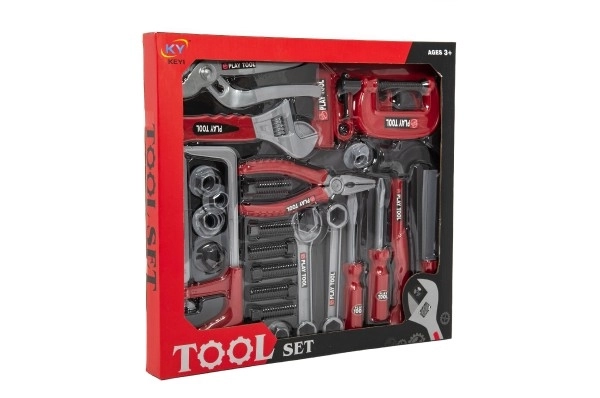 Ensemble d'outils en plastique pour enfants dans une boîte