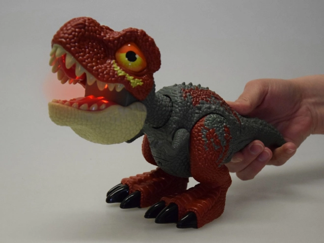 Dinosaure Tyrannosaurus Rex avec parties mobiles et effets sonores et lumineux