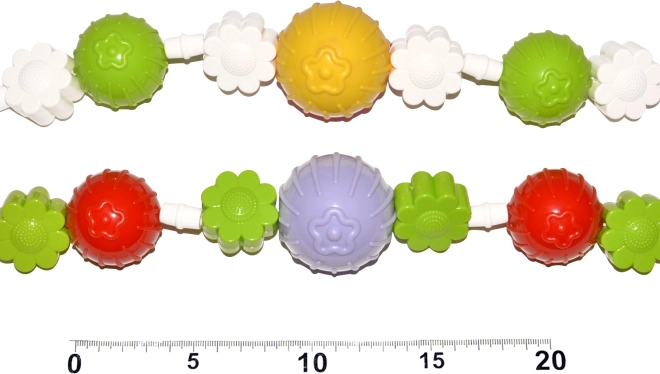 Chaîne de poussette fleurs et boules