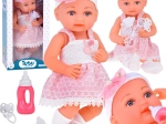 Poupée en caoutchouc en robe rose avec tétine ZA5235