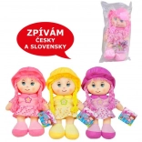 Poupée textile sonore 26 cm