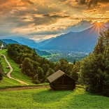 Puzzle Coucher de soleil sur le village de montagne Wamberg 1500 pièces SCHMIDT