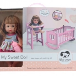 Poupée avec berceau et sons d'enfants