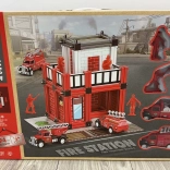 Garage de pompiers avec véhicules de secours et figurines