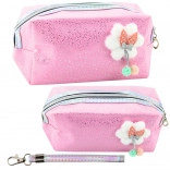 Trousse de maquillage rose avec nœud et paillettes