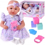 Bébé interactif 46 cm en robe lilas avec accessoires