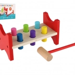 Banc à marteler en bois avec marteau pour développer la motricité